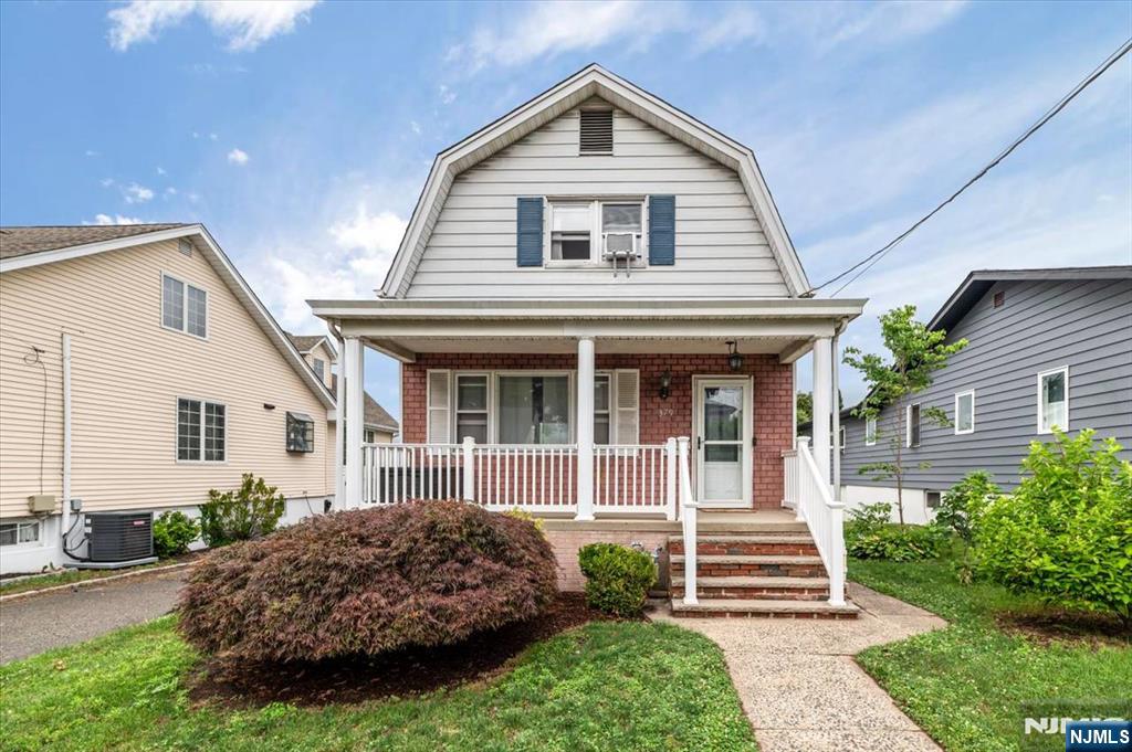 Welcome to this charming Side Hall Colonial, filled with timeless character and inviting living spaces. The first floor features a bright living room, formal dining room, and kitchen with access to a spacious deck overlooking the backyardâ€”perfect for relaxing or entertaining. The backyard offers plenty of green space and includes a detached garage. The second floor features two comfortable bedrooms and an updated full bathroom. The finished basement provides additional living space with a family room, full bathroom, laundry room, utility room, storage, and walk-out access to the backyard. Conveniently located near NYC transportation, this home offers the perfect combination of charm, functionality, and commuter-friendly convenience.