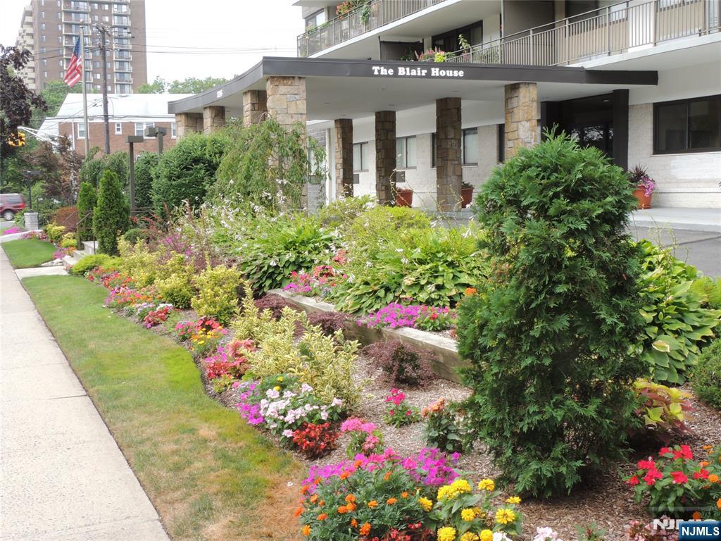 Stunning sunsets and horizon views south to west to north re yours from the appx 20' terrace and all rooms of this Jr. 1 bedroom luxury high rise home. Located in the heart of the prestigious Prospect Avenue area. Loads of light. Modern kitchen and bathroom. Lots of closets including 2 walk-ins. And, LOW monthly maintenance fee and taxes. Garage parking space. Laundry room each floor. Luxurious lobby and hallways. Very nice pool. NYC EXPRESS bus less than one block; near NYC train. Very close to HUMC medical center, all shopping, malls etc.