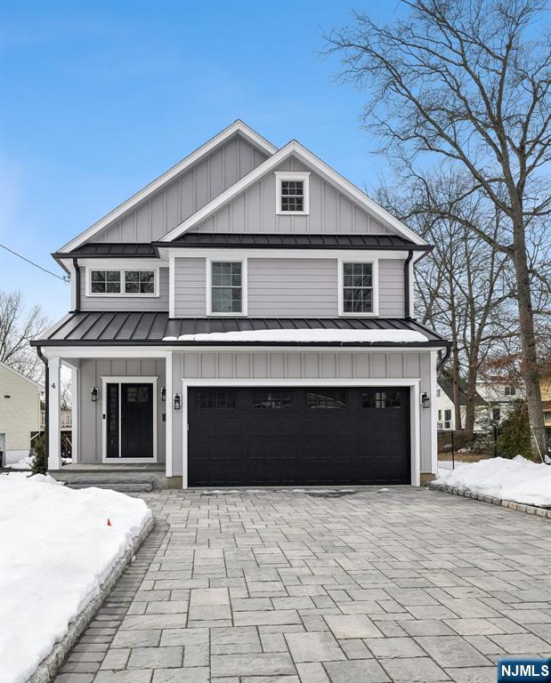 This stunning newly constructed home (with builders' 10 year warranty boasts meticulous attention to detail throughout. 6 Spacious Bedrooms, 5 full & 1 half Baths. First floor boasts open concept Living/Dining Room with gas fireplace & sliding doors to huge deck with gas hook-ups for outdoor entertaining. 2-zone heating & cooling. Beautifully appointed Kitchen with all stainless steel appliances including wine refrigerator, granite countertops, spacious center inland & detailed lighted cabinets. First floor guest Bedroom or Office including full Bath, Mudroom, & Powder Room complete this level. 2nd floor offers 4 luxurious Bedrooms & 3 full Baths plus Laundry Room. Primary Bedroom with vaulted ceiling; ceiling fan & stunning backsplash; fully appointed walk-in closet. Primary Bath has heated flooring & dual sinks. Lower level provides versatile living with access to the backyard. Bedroom with full Bath plus storage area. This home truly maximizes comfort & functionality. Extras include: underground irrigation system, electric charging station conveniently located in the spacious 2-car garage, gutter guards, paver driveway with parking for 4 cars. Newly landscaped on deep lot. Taxes to be assessed. Some photos noted have been virtually staged.
