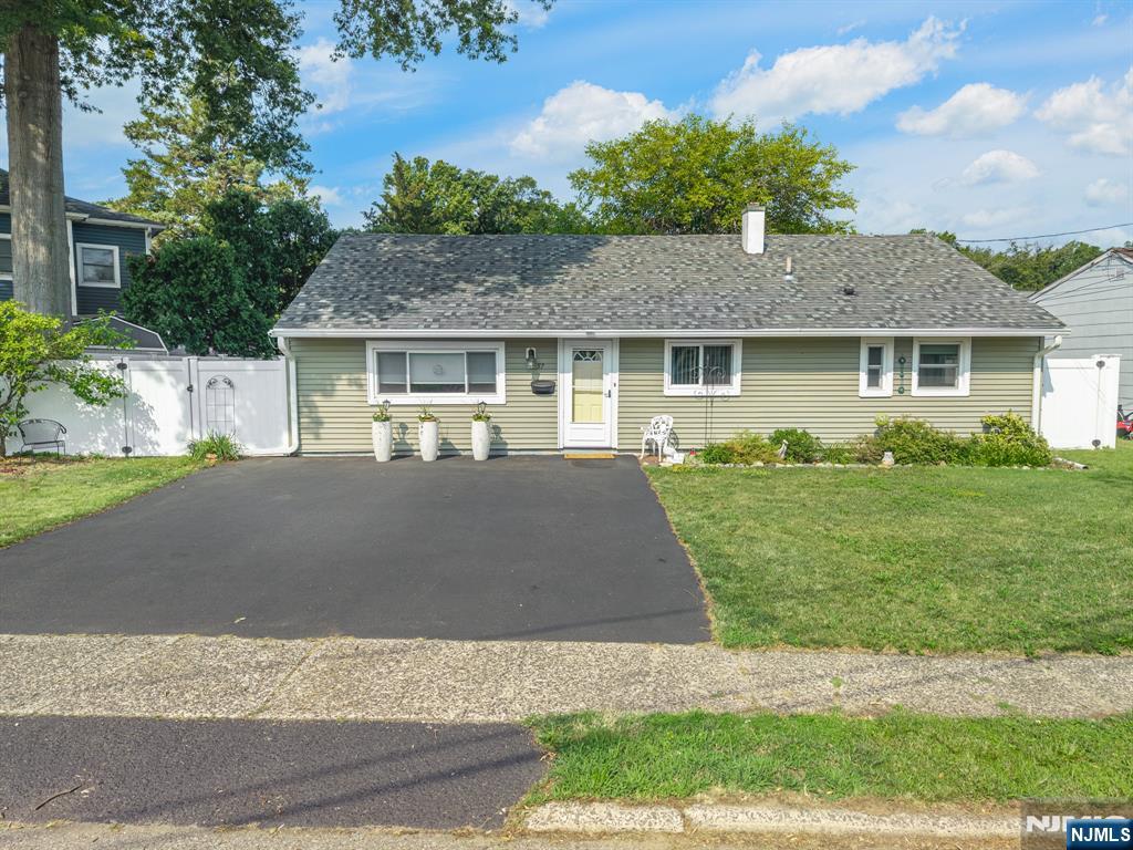 Rare opportunity in Rochelle Park's highly sought-after Lovel section near the county park! This lovingly maintained ranch has the potential for 3-4 bedrooms and the ability to expand or add a second story, ready to grow with your needs. This is one of the few homes that offers a full walk-up attic in the neighborhood, a rare find offering exceptional storage or the perfect opportunity to create additional living space. Outside, discover your own private garden oasis including a Tuff brand shed, vinyl privacy fencing, and a spacious patio to create the perfect setting for morning coffee, summer entertaining, or simply unwinding in your own backyard retreat. Perfectly updated for peace of mind with a new roof (2022), windows (2023), gutters, leaders and drip edge (2023), and central air conditioning (2021). Location is everything! This house is just around the block from Saddle River County Park with miles of scenic walking and biking paths, playground, picnic areas, ball fields, and close to NJ Transit Bus 163 for an easy NYC commute. Enjoy quick access to major highways, shopping, restaurants, grocery stores, malls, movies, and more. If you're looking for a move-in ready home, a house with room to expand, or a property with long-term value, this is a must-see opportunity you won't want to miss!