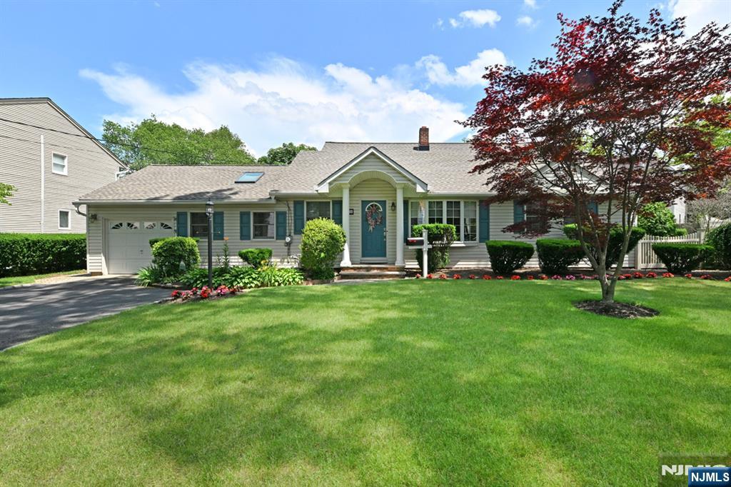 A Paramus Gem! Turnkey Living with Timeless style nestled on a serene, tree-lined street Welcome to this beautifully updated expanded 3 BR 2.5 Bth 2 story Ranch. Larger than appears from outside. 1,677sf. Beautifully maintained & updated both inside & out. 1st floor Primary BR 15' x 15'8" w/Bth & walk in closets is perfect for a flexible layout. Formal LR & DR w/Crown molding, updated MEIK w/granite counters and dining area. Large Family room is 21'4" x 10'6" w/gas FPL, vaulted ceilings, wood beams, skylights, French doors to trex Deck & entry to 1 car attached garage. 2nd floor offers 2 additional spacious bedrooms 2 zone Central Air Newer skylight in Fam Rm approx. 1 year old. Electric Awning. Double width driveway w/Belgium Block driveway. Newer Timberline roof is only approximately 1 year old Vinyl siding Paver walkway U/G sprinklers. Spacious, fenced Yard. Professional landscaping. Washer & dryer are both 1 year old and negotiable Quiet location, yet close to the Park & Ride bus to NYC, the new Valley Hospital, Route 17, Garden State Parkway, shopping & Top Rated schools All measurements are approximate & subject to errors