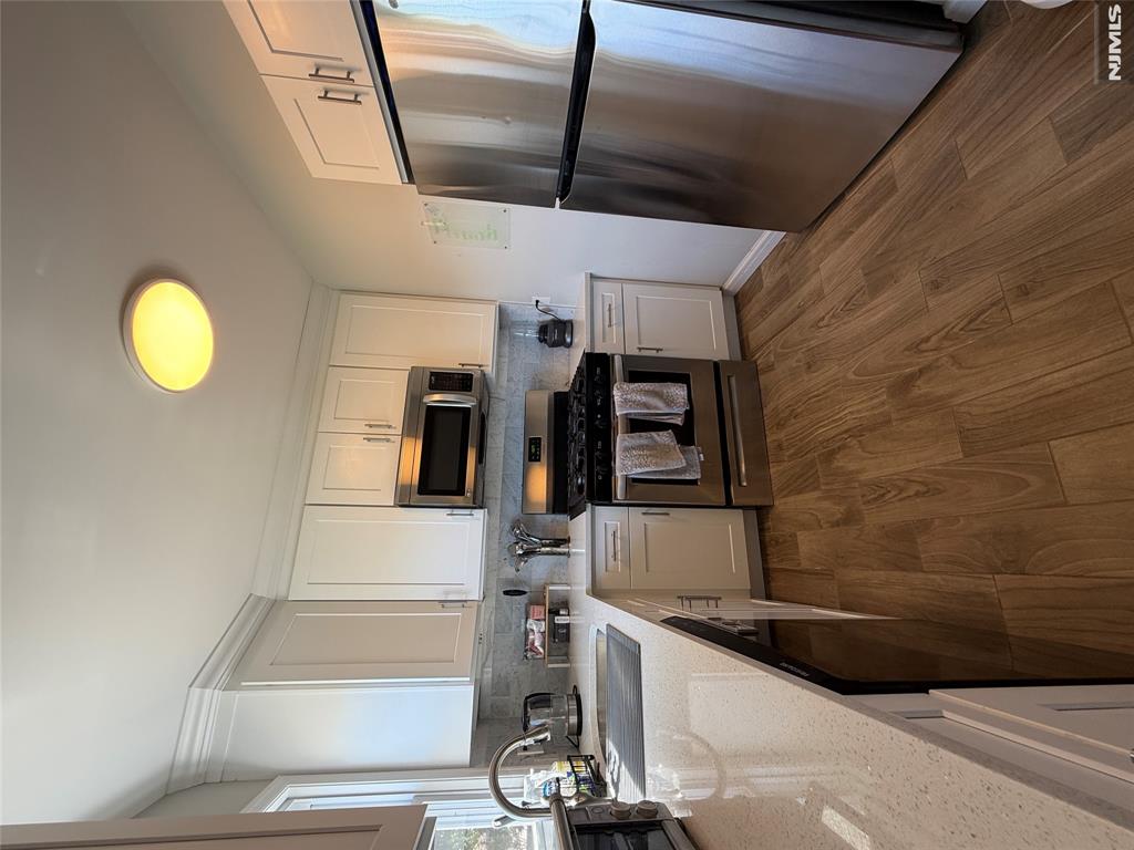 Well-maintained 3-bedroom, 1-bath second-floor apartment featuring a bright and comfortable layout. This unit offers an eat-in kitchen with ample space for dining, in-unit laundry for added convenience, and generously sized bedrooms. Enjoy the privacy of a second-floor location along with plenty of natural light throughout. The rental also includes one dedicated parking space.Conveniently located near shopping, dining, public transportation, and major roadways, this apartment provides both comfort and accessibility.