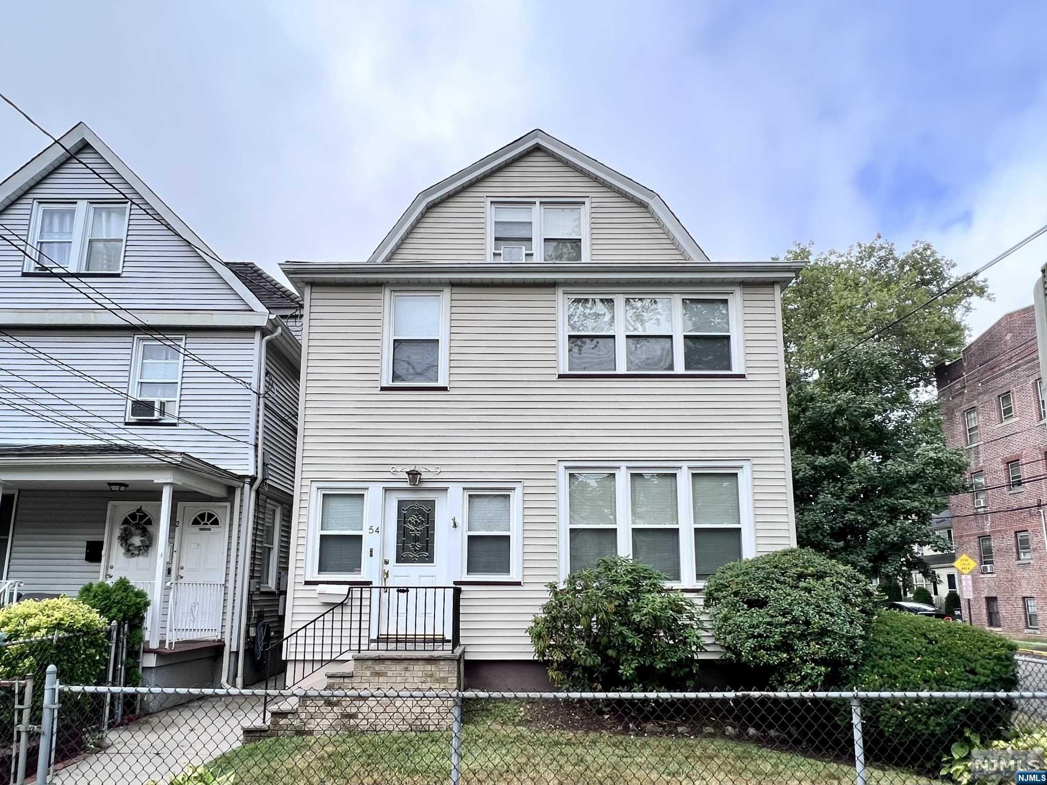 Hands-down the best value for a multi-family home in town! This two-family property offers three levels of living as well as a partially finished basement. The first unit features two bedrooms, one full bath along with an eat-in kitchen with a breakfast bar. It also has access to the partially finished basement which includes a half bath. The second unit features three bedrooms, two on the second floor, one on the third floor and also includes hardwood flooring and good-sized closets throughout. New furnace. Property is heated by oil however there is separate gas to each unit for cooking. Also this home features separate hot water heaters as well as separate electric.