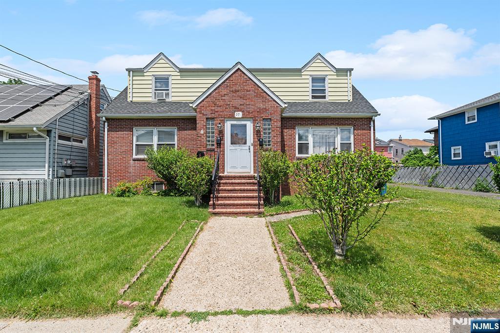 A MUST VISIT! 2 Family brick/vinyl home on an OVERSIZED LOT in North Arlington located in Bergen County. This home features four bedrooms, two bathrooms, two car oversize garage with electricity and featuring a long driveway for 8+ cars. 1st fl : living room, kitchen, full bath, 2 bedrooms, sun room 2nd fl : living room, kitchen, full bath, 2 bedrooms Basement : family room, full unfinished, storage room, utility Long driveway : 8 cars 2 car over sized garage w electric Rents 1st fl : $1900 month-to-month lease 2nd fl : $1100 month-to-month lease 2 car garage: $400 month-to-month lease. This location is close to parks, schools, strip mall shopping centers, New York City, transportation. Unbeatable, highly rentable location close to local parks, schools, strip mall shopping centers, public transportation, and an easy commute to New York City. Don't miss out on this versatile Bergen County gem!