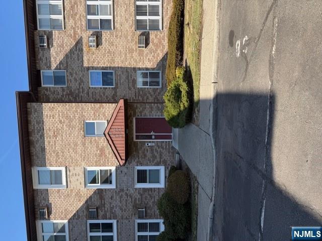 Spacious Condo in Riverview Court! This well-maintained first-floor unit features a large bedroom with a walk-in closet and a generous L-shaped living and dining area, perfect for comfortable living and entertaining. The unit offers both front and rear access, with convenient parking located directly outside. Recent updates include newly replaced windows and a water heater. Enjoy the convenience of in-unit laundry, along with low taxes and maintenance fees. The complex is ideally located near New York City transportation and a newly renovated playground just steps away.