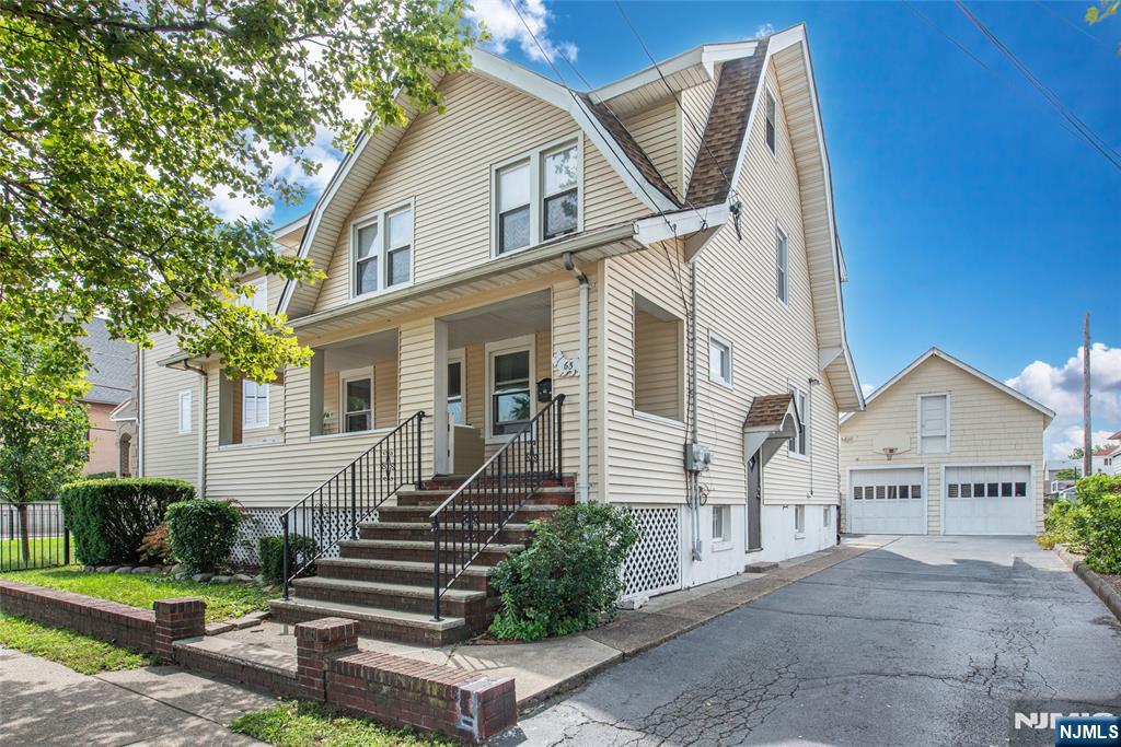 This Hackensack two-family property offers a rare opportunity for owner-occupants & investors alike. Featuring a total of 4 BRs & 2 FBs, this well-maintained home comprises two separate residences with functional layouts, generously sized rooms, & abundant storage. The first-floor residence offers two BaRs, a spacious living room, a separate great room, an eat-in kitchen with an adjoining pantry, & one FB. Comfortable room proportions & abundant natural light create an inviting setting for everyday living. The second-floor residence features two well-proportioned BRs, a bright living room, an eat-in kitchen, & one FB. A large unfinished walk-up attic provides substantial storage & potential for future use, subject to all required municipal approvals. The basement includes a laundry area, utilities, multiple dedicated storage areas, & additional space for household or tenant use. Exterior features include a welcoming covered front porch, a private fenced backyard, a paver patio, a detached 2-car garage, & additional driveway parking. Ideal for buyers seeking rental income, multigenerational living, or the opportunity to occupy one residence while generating income from the other. Conveniently located near shopping, dining, schools, parks, public transportation, & major highways, with easy access to New York City for commuters. A property offering flexible living arrangements, valuable storage, & tremendous potential in a convenient Hackensack location.