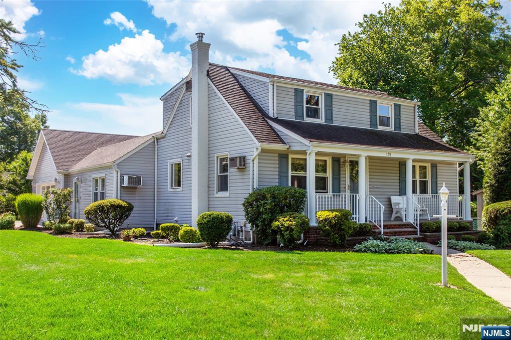 Welcome to this beautifully expanded 5-bedroom, 2 full bath Cape Cod, perfectly situated on a desirable corner lot in one of Washington Township's most sought-after neighborhoods. From the inviting lemonade front porch to the spacious interior, this home blends charm, comfort, and functionality. Gorgeous oak hardwood floors flow throughout, while the renovated kitchen features espresso cabinetry, granite countertops, stainless steel appliances, and ample storage. Unlike a typical Cape, this thoughtfully expanded home offers a rare second living room and separate dining room connecting the main house to the brand-new oversized two-car attached garage, creating a practical floor plan with the extra living space today's buyers desire. The flexible layout provides five bedrooms, two full baths, and a full-height unfinished basement ready to be finished into additional living space, a recreation room, gym, or home office. Enjoy a private backyard perfect for entertaining or relaxing. Conveniently located near parks, shopping, restaurants, and transportation, this move-in ready home offers exceptional space, versatility, and value. This is not your typical Cape Cod, it is one of Washington Township's best values and won't last long.