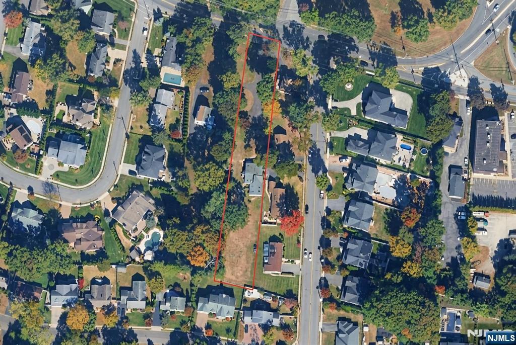 Excellent residential development opportunity located in a desirable section of Paramus. This property is fully approved and subdivided for the construction of 2 new 6000 sqft single-family homes, allowing a developer or investor to move forward without the uncertainty and extended timeline typically associated with the subdivision approval process. Take advantage of this rare opportunity to build 2 new construction homes in the highly desirable Paramus market, known for its strong buyer demand, highly regarded schools, convenient access to major highways, and proximity to Garden State Shopping Center, dining, parks, and New York City transportation. With the subdivision already completed, the property offers an attractive opportunity for a builder seeking a streamlined development project with the potential to construct and sell two homes in an established residential neighborhood. Approvals, plans, surveys, and additional property information are available upon request. Renderings are for illustrative purposes only and may differ from the completed home, including finishes, features, dimensions, landscaping, and other design elements.