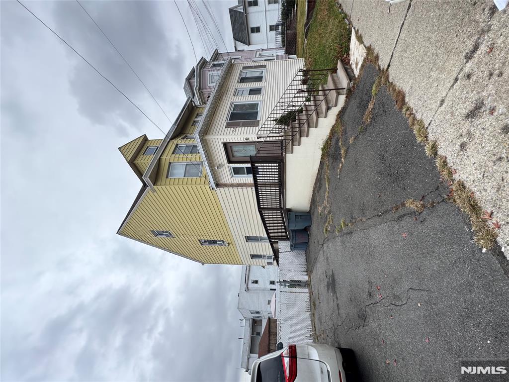 Large well kept 5 Bedroom Colonial in desirable location. First floor features Living Room, Dining Room, Eat in Kitchen w/ Island, Full Bathroom. Second floor features Main Bedroom w/ Walk in closet, 2 additional bedrooms and Full Bath. Third level features 2 additional bedrooms with full bath. Full basement finished with plenty of storage space and additional space which can be used for recreation and a Full Bathroom. Roof approximately 10 years old. Newer furnace replaced by PSEG. Home is in move in ready condition and is being sold As-Is. Hurry, this one will not last. Large driveway for up to 10 vehicles...