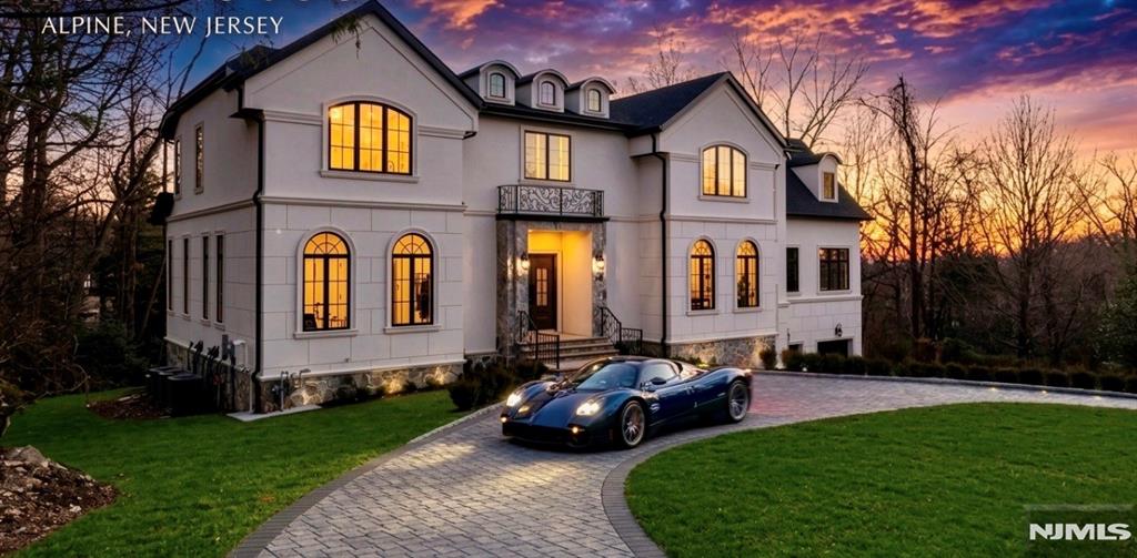 Welcome to a rare opportunity â€” a brand new construction luxury home nestled on a private one-acre lot at the top of a quiet cul-de-sac, just 20 minutes from New York City. This extraordinary 6-bedroom, 7.5-bath residence spans approximately 8,900 SF and was designed with intention: soaring floor-to-ceiling windows, sleek architectural lines, and warm textured materials create a home that feels both sophisticated and inviting. Gather in the open-concept living and dining spaces, cook in the stunning bespoke kitchen, or step outside to the terrace for seamless indoor-outdoor living. The walkout lower level is its own world â€” wine cellar, home theater, gym, and a rec room with a full bar and billiard area. Upstairs, the generous primary wing is complemented by three ensuite bedrooms and a family room, while an additional bedroom on the first floor adds versatility. Elevator-ready for long-term convenience .High end finishing's custom closets , Porcelanosa tiles, Heated bathroom floors .Sub Zero fridge Thermador appliances Come see yourself call for showings 201-9667857