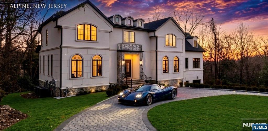 Welcome to a rare opportunity â€” a brand new construction luxury home nestled on a private one-acre lot at the top of a quiet cul-de-sac, just 20 minutes from New York City. This extraordinary 6-bedroom, 7.5-bath residence spans approximately 8,900 SF and was designed with intention: soaring floor-to-ceiling windows, sleek architectural lines, and warm textured materials create a home that feels both sophisticated and inviting. Gather in the open-concept living and dining spaces, cook in the stunning bespoke kitchen, or step outside to the terrace for seamless indoor-outdoor living. The walkout lower level is its own world â€” wine cellar, home theater, gym, and a rec room with a full bar and billiard area. Upstairs, the generous primary wing is complemented by three ensuite bedrooms and a family room, while an additional bedroom on the first floor adds versatility. Elevator-ready for long-term convenience .High end finishing's custom closets , Porcelanosa tiles, Heated bathroom floors .Sub Zero fridge Thermador appliances Come see yourself call for showings 201-9667857