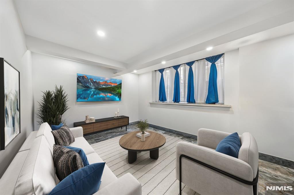 Move-in ready 2-bedroom, 1-bathroom condo with den in North Bergen, NJ. This sun-filled, fully renovated unit features central heating and abundant natural light throughout. Located one block from Boulevard East, residents enjoy direct bus service to NYC Port Authority in under 30 minutes, plus walkable access to the Port Imperial Ferry â€” one of the fastest commutes to Midtown Manhattan from New Jersey. Steps from James Braddock North Hudson County Park, offering a lake, walking trails, sports courts, and playgrounds. Ideal for first-time homebuyers or real estate investors seeking a turnkey rental property in Hudson County. Priced competitively in one of Hudson County's most transit-accessible neighborhoods.