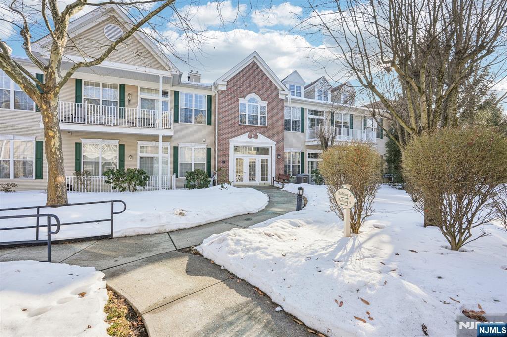 Welcome to Resort-Style Living at the Four Seasons in Wayne! This beautifully maintained and updated second floor Cherry model end unit has 2-bedrooms, 2-baths and is nestled within one of Wayne's most desirable 55+ communities offering the perfect blend of luxury, comfort, and convenience. Features include: all freshly painted, new high style flooring and carpet- 2/26, high ceilings, abundant natural light, and an open floor plan. Oversized living and dining rooms are enhanced by recess lighting and tons of windows. The eat-in kitchen provides ample cabinet and counter space. There is a breakfast area with sliding glass doors to your private terrace. Lovely primary suite offers 2 closets, one is a large walk-in closet, and a private bath with a stall shower, and huge vanity with double sinks. There is a second bedroom and full bathroom. Additional attributes: a laundry room with washer and dryer, indoor garage parking with elevator access, a large storage room/den in unit with extra storage in the garage, guest parking and shared hallway storage. Enjoy the resort-style lifestyle with a clubhouse, community activities, pool, pickleball, billiards, fitness center, library, and bocce. It is conveniently located to shopping, restaurants, parks, Trader Joe's, Wayne public library, Whole Foods, major highways, and NJ Transit Bus and Train Center.