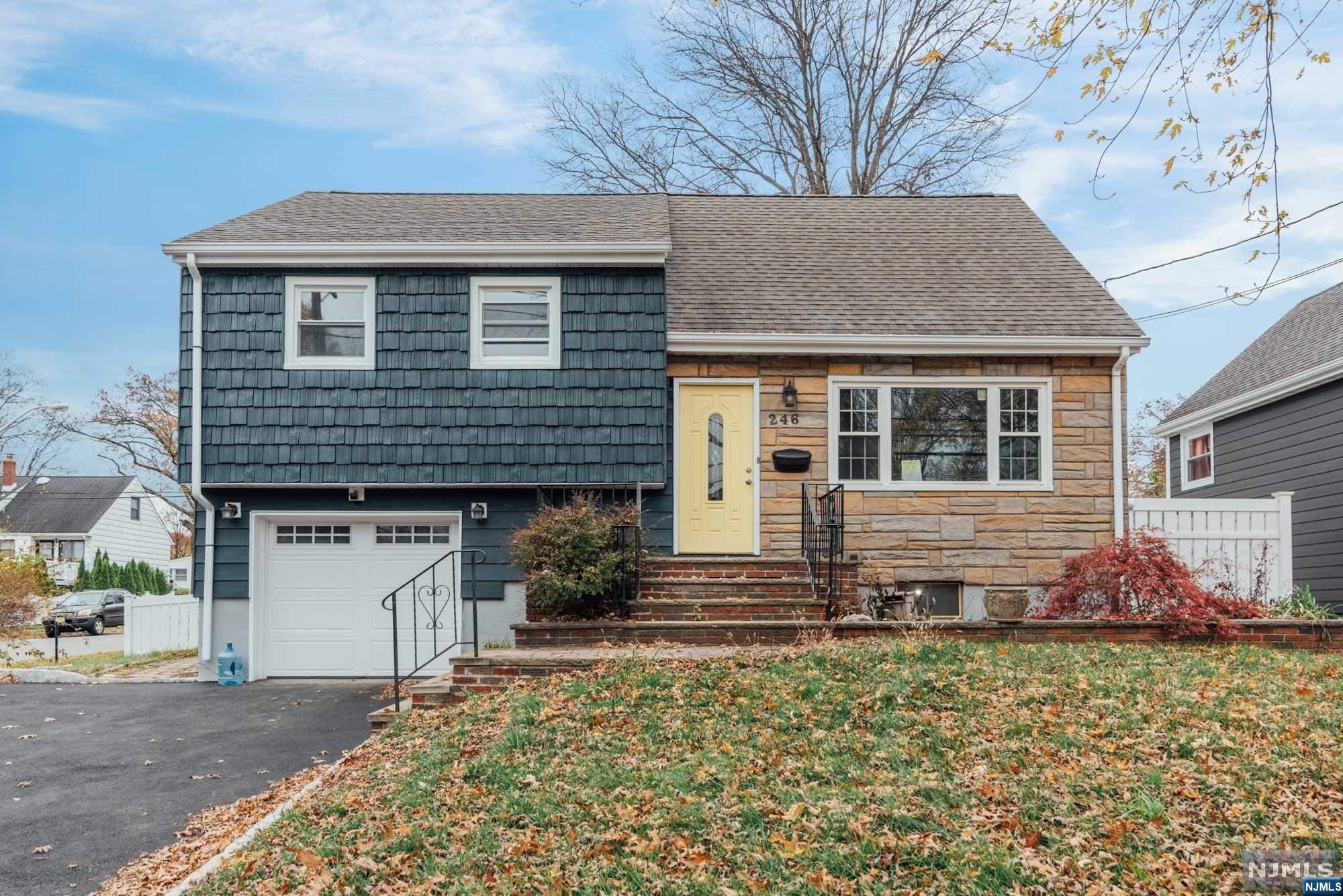 Move right into this beautifully renovated 3-bedroom, 1.5 bath split level home in the desirable Brookdale section on the Montclair-Glen Ridge border. Great location, 20 minutes to Manhattan, near NYC buses, major highways, including GSP, and just 1.4 miles from the NYC train. Beautiful Brookdale Park is 3 blocks away! Open bright floor plan, hardwood floors, brand new eat-in kitchen with granite countertops, breakfast bar and recessed lighting, brand new stainless-steel appliances, soft close drawers, under-cabinet lighting, and new windows. 3 generous bedrooms, newly renovated bathrooms with new fixtures, modern features, and a formal dining room with a door to the large backyard patio. The ground level includes a laundry nook, half bath, and access to the garage. The lower level boasts a rec room and a utility room, perfect for a gym or playroom. Plenty of parking spaces with a double-width paver driveway and attached garage. Corner lot with privacy fence, large backyard + deck
