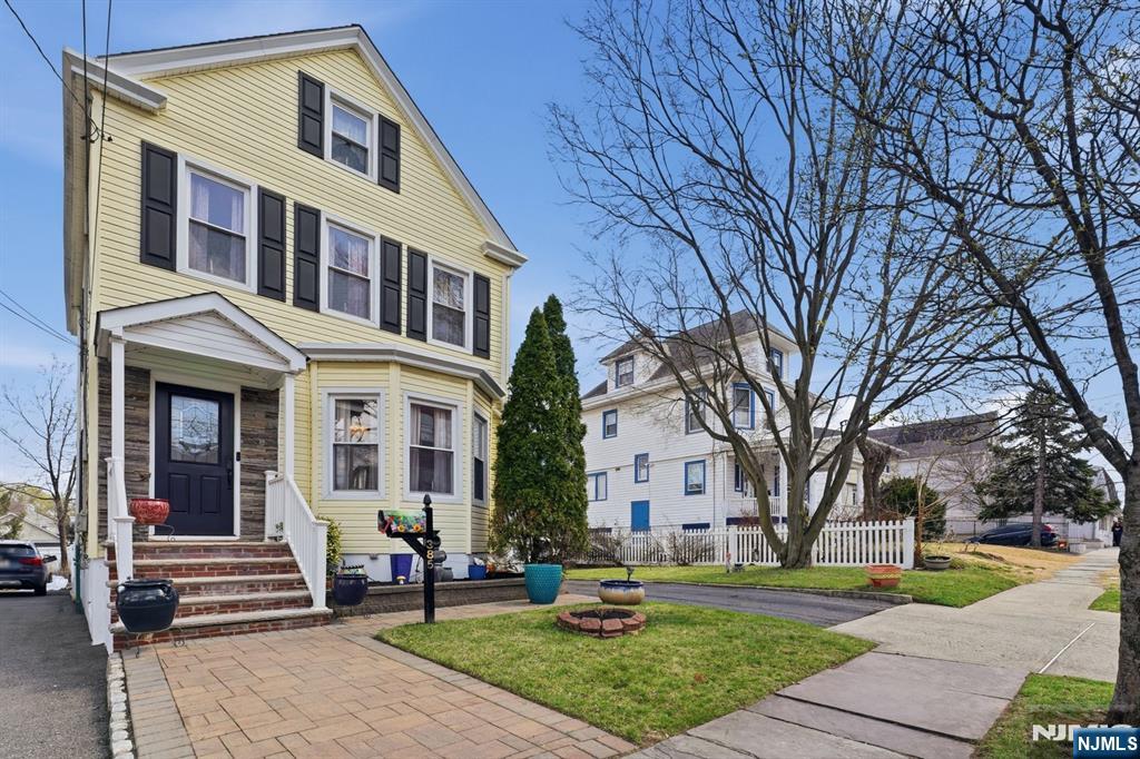 Impressive 7,500 sq ft lot located in one of the most desirable neighborhoods. Welcome to Berkeley Avenue, a beautiful property offering incredible opportunity for the next owner, featuring a large deck, finished walkout basement, expansive lot, ample parking, and more. The first floor welcomes you with hardwood floors throughout, an open concept living and dining area, a renovated kitchen with granite countertops and a breakfast bar, a renovated half bathroom, and a sunroom with direct access to the deck. The second and third floors offer a total of three bedrooms and a full bathroom. The fully finished basement includes a full bathroom, a spacious entertainment area, and walkout access to the backyard. The property has been meticulously maintained and is centrally located near schools, parks, downtown Montclair, major highways, and public transportation.