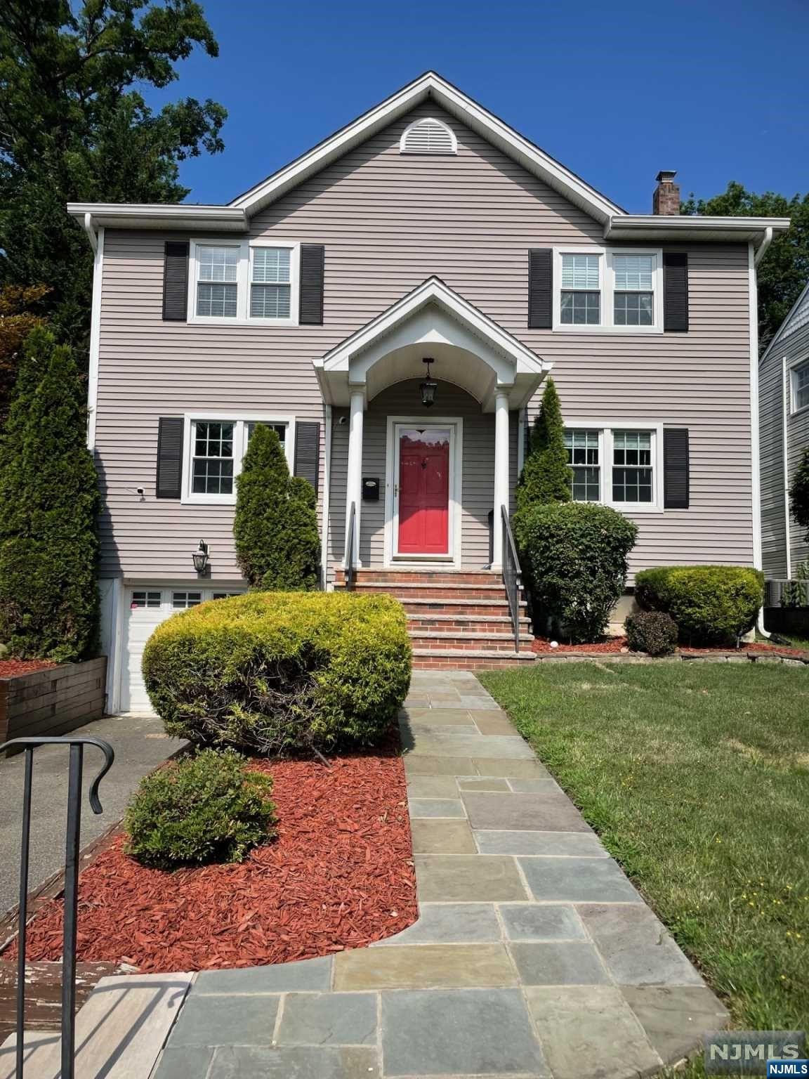 Move right in to this charming center hall colonial! The first floor open concept can be used as you wish and is perfect for entertaining. Take the party outside to the large deck and fully fenced private yard. The second floor offers 2 bedrooms plus a full bathroom as well as a primary suite. The bright and spacious primary suite features two walk-in closets and a resort-like bathroom. Finally, make your way downstairs to the partially finished basement which offers a rec room, half bathroom, laundry/utility room, ample storage space, and access to the attached garage. Easy access to schools, parks, houses of worship, shopping, and public transportation.
