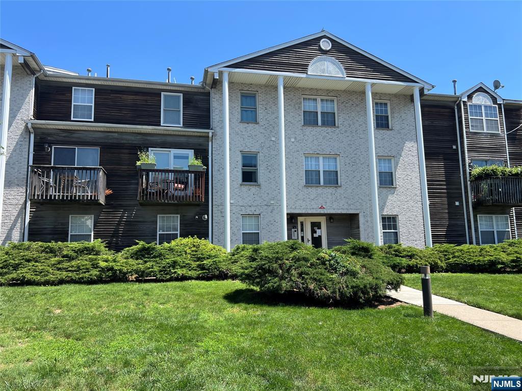Two levels of living in this condo!! First floor has an open concept Living/dining rm Kitchen with a half bath and access to the balcony the perfect spot to relax or let in natural light. Kitchen has stainless steel appliances and plenty of cabinet space with hardwood flooring throughout this level. Upstairs you will find the Full bath with 2 nice sized bedrooms and laundry , Unit has central air and forced hot air also comes with 2 parking spaces