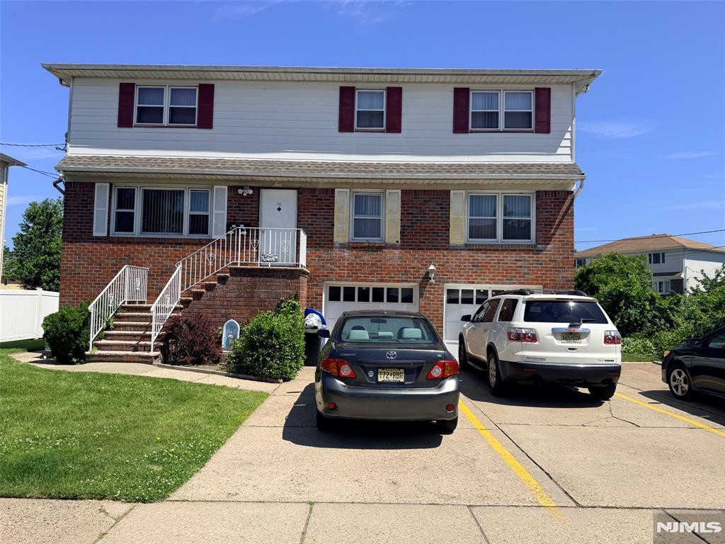 Beautiful, spacious, and well-maintained 1st-floor apartment featuring 3 bedrooms, 2 full bathrooms, master bedroom with a full bathroom. All-hardwood floors throughout, an updated kitchen with granite countertops and stainless steel appliances, and an open layout perfect for comfortable living. Additional features include central air conditioning, washer and dryer hookups in the unit, and use of the backyard. Driveway for 2 cars, tenant will be responsible for snow removal for their side.