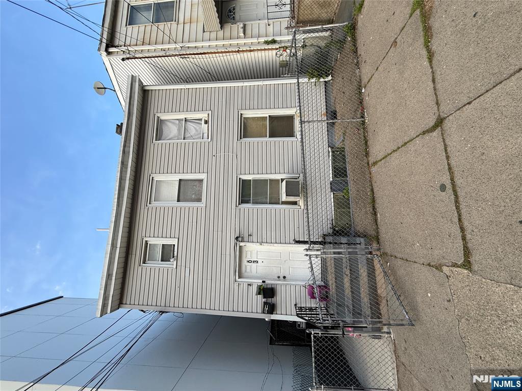 Donâ€™t miss this well-maintained 7 bedroom, 3 bathroom multifamily investment opportunity generating $5,200/month in total rent with all tenants on month-to-month leases â€” giving you maximum flexibility whether youâ€™re an owner-occupant or pure investor. Ideally located just blocks from the train station, bus lines, schools, shopping, and dining. Updated in 2020, this property is perfectly positioned for an owner-occupant to live in part of the home while collecting rental income from the rest, or for an investor to keep it fully leased for strong cash flow from day one. The first floor features a comfortable living room, eat-in kitchen, 4 bedrooms, and a full bath, offering generous space and functionality. The second floor includes a living room, eat-in kitchen, 3 bedrooms, and a full bath. The finished basement adds valuable bonus living space, further enhancing the propertyâ€™s versatility and value. Practical layouts and thoughtful updates enhance everyday living throughout. Outside, the fully fenced backyard includes a patio ideal for outdoor dining and grilling. With flexible living spaces, a finished basement, $5,200/month in existing rental income, month-to-month tenancy flexibility, and a commuter-friendly location, this is an excellent opportunity to own a versatile multifamily property in a convenient neighborhood