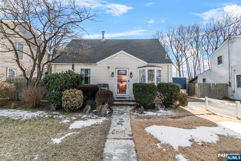 Welcome to this beautfully updated 3-bed, 2-bath Cape Cod home, nestled on a quiet street in the heart of Haskell. Freshly painted in neutral tones and featuring brand new flooring on the 2nd level, this home is move-in ready with modern touches and timeless charms. Step inside to find bright and inviting living spaces, including updated bedrooms and a well-appointed kitchen with stainless steel appliances. The home boasts a newer roof (2 yrs old!), ensuring peace of mind for years to come. Outside, enjoy the expansive, level yard - perfect for entertaining around the fire pit or simply unwinding in a serene setting. A detached garage provides additional storage or workspace. Conveniently located near major highways, shopping, and dining, this home offers the perfect blend of comfort and convenience. Don't miss out - schedule your showing today!