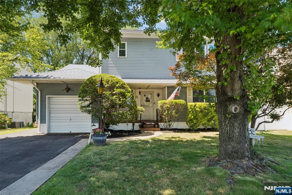 Step right up to this massive 4 bedroom, 4 full bath home in Hasbrouck Heights. The top floor was newly added in 2019 and features high ceilings and two bedrooms, each with their own ensuite. The primary bedroom boasts dual walk-in closets, both a shower stall and jetted bath with shower, washer/dryer hook-ups, and added room for a couch, TV, or some workout equipment. The main floor features two bedrooms, a recently remodeled full bath, and a pristine kitchen, dining room, and living room. You can access the back deck and yard through the dining room, where you will find a quaint set-up for backyard BBQs, fire pit, and seating areas. With an additional kitchen and four rooms of living space in the fully finished basement, this home provides ample room. The garage was converted to added living space, however it can be converted back for a workshop, storage, or car. Brand new kitchen appliances as of Fall 2025. Reach out to book your showing today.