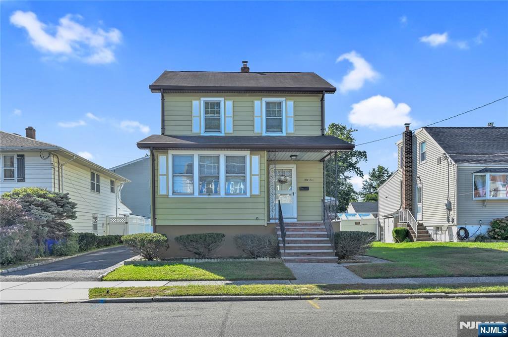 Discover this well maintained 3-bedroom, 2-bath Colonial in sought-after Saddle Brook! Featuring a bright and open layout with a spacious living room, formal dining room, open kitchen, versatile home office, and first floor full bath. Upstairs offers 3 inviting bedrooms and a full bath. Additionally, there is a walk up attic for additional storage. Enjoy hardwood floors, a full basement for future finishing, and private parking for 3 cars. This home is close to top schools, shopping, parks, worship, and NYC transportation. A fantastic opportunity to add your personal touch and create your dream home!