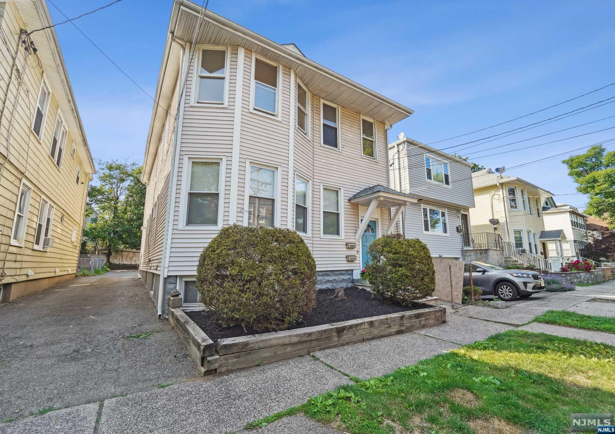 Lovely and updated 2-family home located just across from Glenfield School. Short stroll to Bay Street train station and Bloomfield Avenue's many restaurants and shops. First floor features 2 bedrooms and 1 bath. Second floor (currently vacant) has been updated and features 4 bedrooms, 1 bath, & kitchen with new appliances. Both units have living room, dining room and eat-in kitchens. Perfect owner occupied opportunity.
