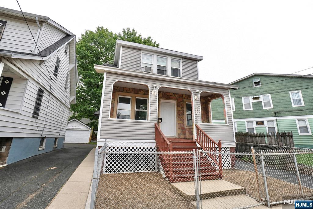 Renovated two-family home in Newark featuring two units, each with 3 bedrooms and 1 bath. Property includes a detached garage in the backyard, 1-car width driveway, spacious backyard, and enclosed front porch. Conveniently located near public transportation, major highways, shopping, and schools. Ideal for investors or owner-occupants seeking strong rental potential and easy NYC access.