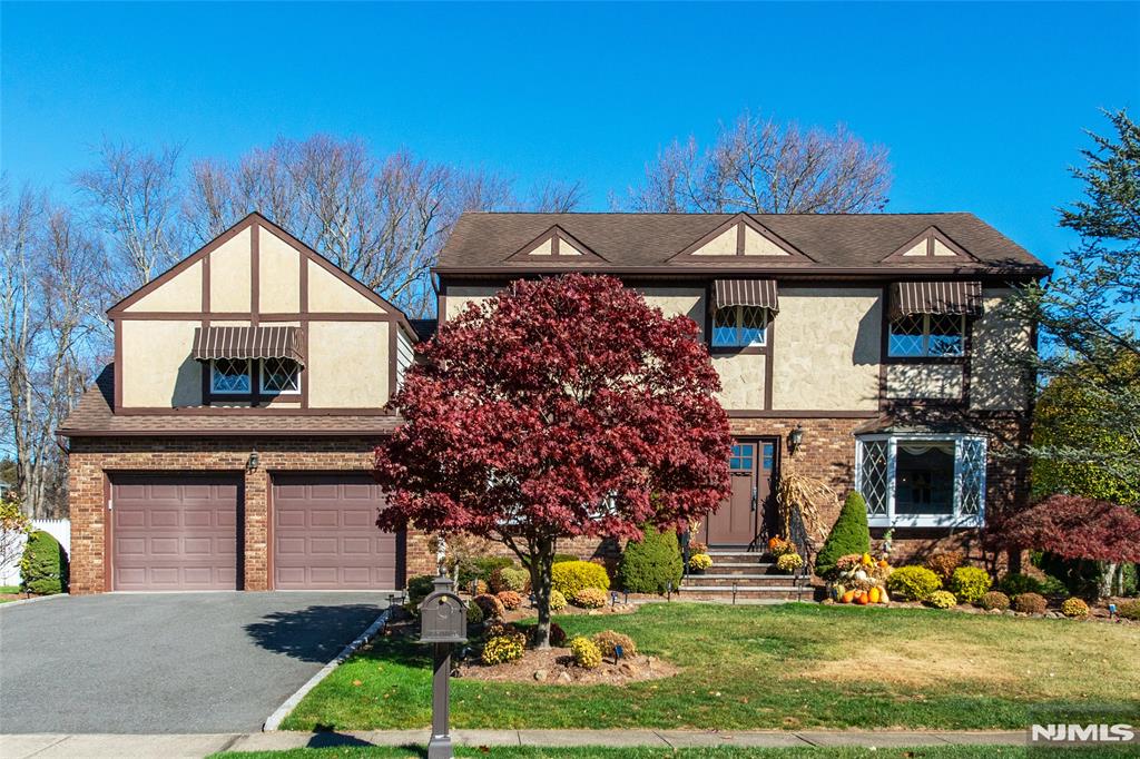 Move right into this immaculate 2-story Colonial home on cul de sac thatâ€™s been meticulously cared for and enhanced by the original owners. Completely maintenance-free brick, stucco, and vinyl exterior, along with in-ground sprinklers, means more time for relaxing in the private backyard featuring TimberTech deck with 15-foot built-in luxury swim spa and Four Seasons sunroom with glass cathedral ceiling, perfect for enjoying the outdoors no matter the weather. Inside, prepare and enjoy meals in the large, updated eat-in kitchen, featuring maple cabinetry, Caesarstone Quartz counters, JennAir appliances, and heated floors, topen to family room on one side and large formal dining room on the other, perfect for celebrating all the holidays. Entertaining is a breeze with indoor/outdoor sound system and deck surrounded by sliders from family room, kitchen, and sunroom. Marble powder room, large laundry room with custom cabinets, and sun-drenched living room complete the first level. Master bedroom suite plus three generously sized bedrooms are up the main stairs, along with hallway bath featuring marble countertop and tile to the ceiling. Bonus room over the garage features custom home office with 3 workstations and lots of storage â€“ with flexibility to be an extra bedroom or playroom. No water entry has ever occurred in this home, even during floods of record. A rare opportunity to live on one of the most desirable streets in Fairfield.