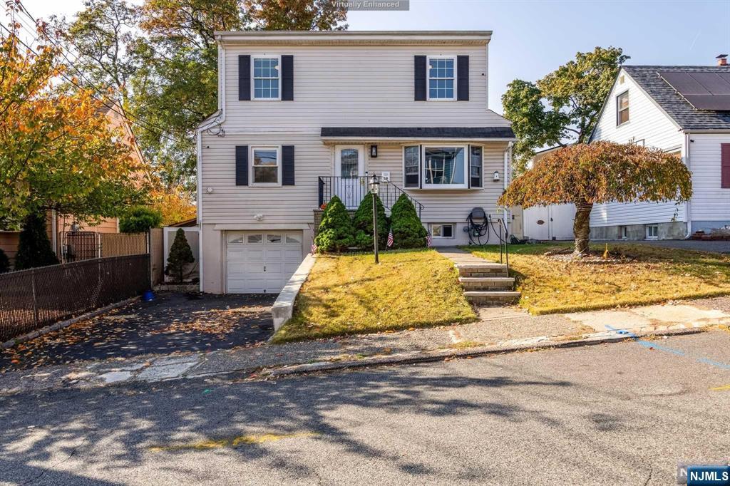 Welcome to this charming spacious single-family home in Passaic Park! Recently expanded, this home offers more space than meets the eye, with beautiful hardwood floors throughout and a fully finished basement, perfect for recreation, a home office, or extra storage. Ideally located near major highways, commuting to NYC is a breeze. Enjoy the perfect blend of suburban comfort and urban convenience in this hidden gem schedule your showing today