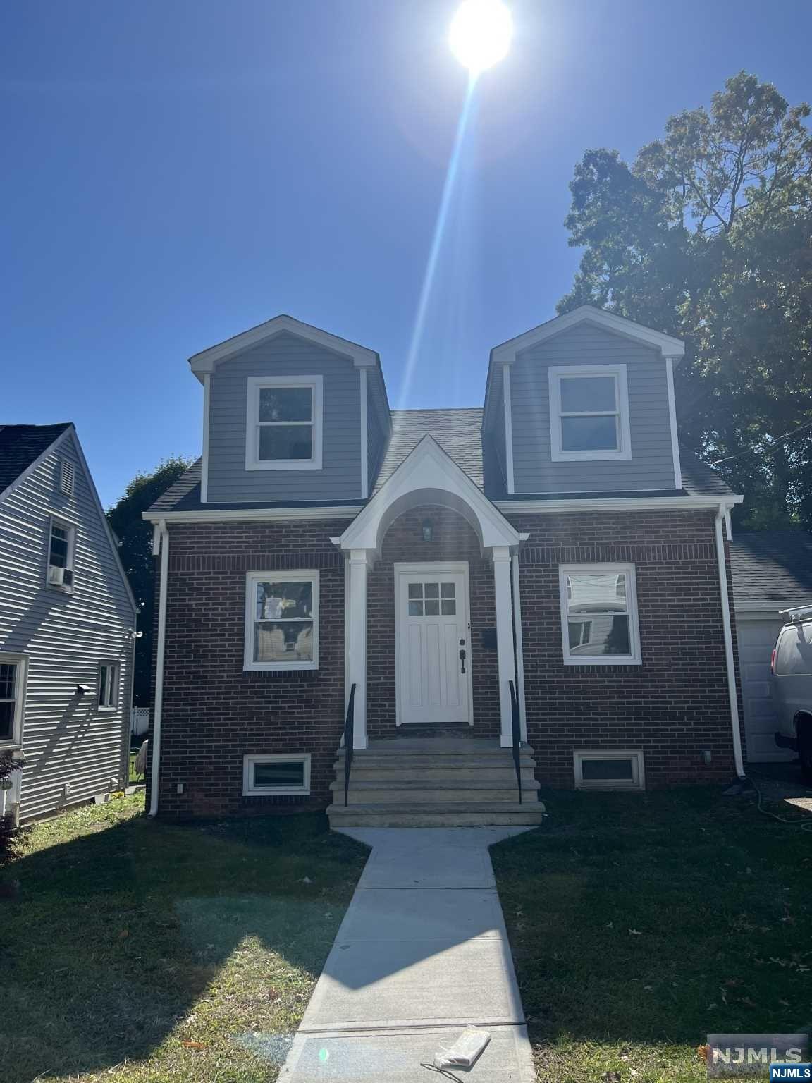 NOT TO BE MISSED. Totally renovated from top to bottom and move in ready. New HEAT,A/C,HOT WATER HEATER,ROOF, and all new appliances. First floor features eat-in kitchen, full bath, living room, and 2 nice bedrooms with lots of built ins. 2nd floor has very large primary bedroom with full bath that is gorgeous. Imagine entertaining of the gorgeous deck overlooking a large, flat backyard that is fenced in. HARDWOOD FLOORS THROUGHOUT