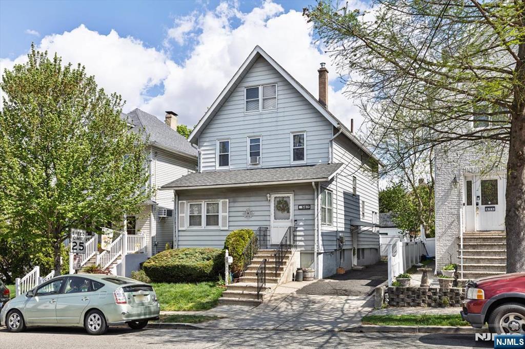 Welcome to this well-maintained two-family home, ideally situated in the heart of Lyndhurst. The first unit features a spacious studio-style layout with a living room, dining area, eat-in kitchen, full bath, and a versatile den. The second unit offers two generously sized bedrooms, a bright living room, an eat-in kitchen, and a full bath, along with access to a finished walk-up third floor that can serve as an additional bedroom or flexible living space. The finished basement provides added value with a recreation room, office or potential bedroom, full bath, and a utility room. Step outside to a private backyard complete with a gazeboâ€”perfect for entertaining or relaxingâ€”along with ample outdoor space to enjoy.