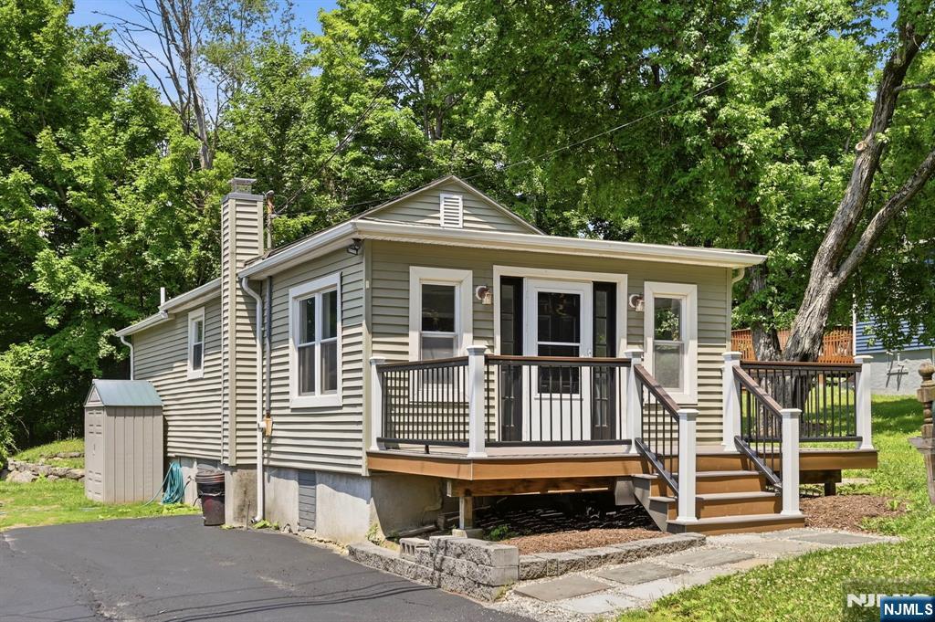 Welcome To This Charming 2 Bedroom Home In Upper Greenwood Lake! The Living And Dining Area Features New Flooring, Creating A Bright And Inviting Space. The Galley Style Kitchen Offers Ample Cabinetry, New Countertops, And New Flooring. 2 Bedrooms And An Updated Full Bath Complete The Home. Freshly Painted Throughout, This Move-In-Ready Home Also Features New Lighting And A Brand-New Front Porch/Deck. Ideally Located Near Schools And Wawayanda State Park, You'll Enjoy Year-Round Recreation Including Hiking, Fishing, Boating, And Scenic Nature Trails. Just Minutes From Endless Opportunities For Adventure, Whether Heading To Mountain Creek For Skiing And Water Park Fun, Catching A Movie At The Nostalgic Warwick Drive-In Theater, Or Exploring Warwick's Charming Main Street With Its Boutique Shops, Orchards, Wineries, Cideries, Restaurants, And Seasonal Festivals. Whether You're Looking For A Full Time Residence, Weekend Getaway, Or Investment Opportunity, This Home Offers It. Schedule A Showing Today!