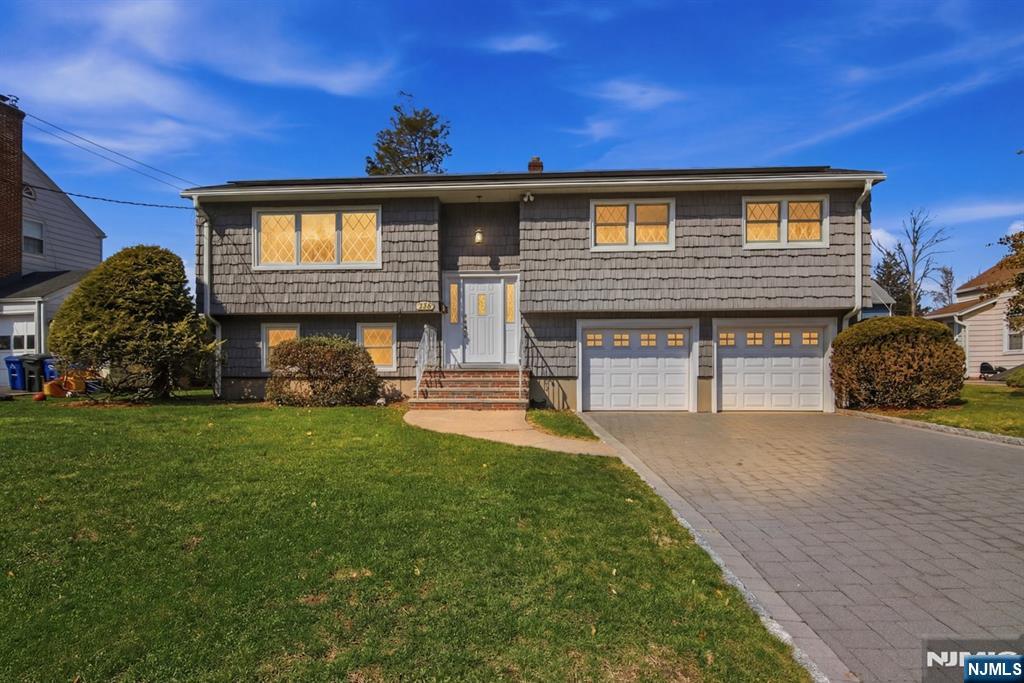 LOCATION! LOCATION! Talk about a Cedar Grove GEM! The kind of home buyers wait for! Impeccably maintained and filled with opportunity, this spacious split-level offers the perfect blend of comfort, functionality, and future potential. Freshly painted with beautifully refinished hardwood floors, the home features 4 generously sized bedrooms, sun-filled living and dining spaces, a spacious family room perfect for entertaining, and an oversized attached 2-car garage. The expansive backyard offers plenty of room to relax, play, garden, or create your dream outdoor retreat. Whether you choose to enjoy its timeless charm or update at your own pace, this home provides an exceptional foundation to make it uniquely yours. Ideally located in the heart of Cedar Grove, just moments from parks, shopping, restaurants, top-rated schools, major highways, and NYC transportation. Homes with this combination of location, layout, and value don't come along often! Solar panels are leased (approximately $50/month) through 2036.