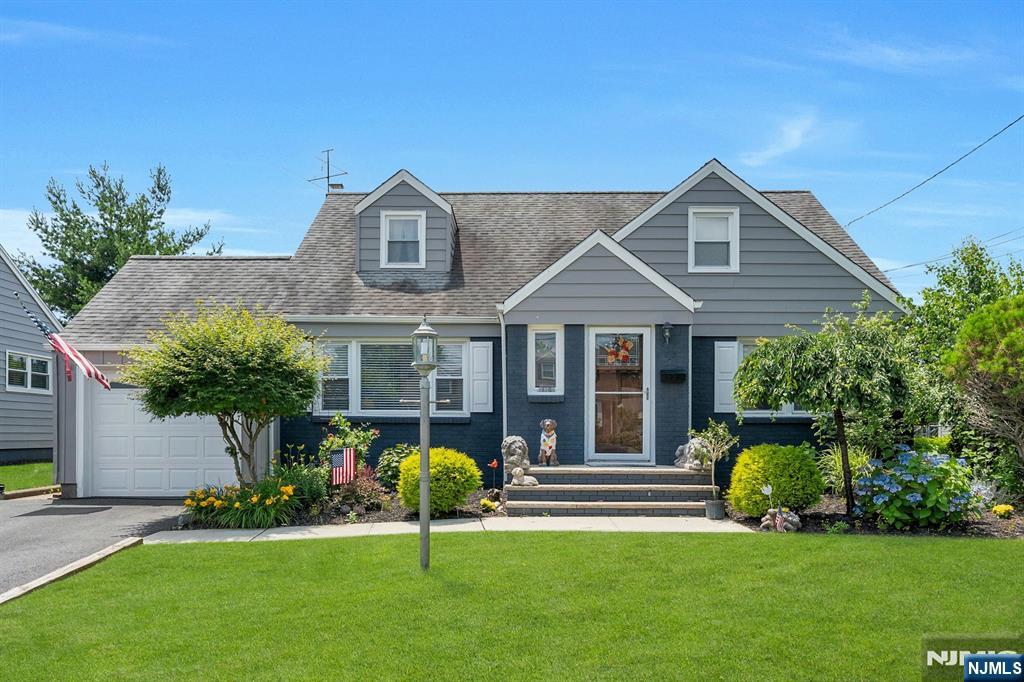 A Place to Hang Your Heart! Fall in love with this charming Cape Cod home located in one of Hasbrouck Heightsâ€™ most sought-after neighborhoods. Step into the welcoming entry foyer and take in the beautiful hardwood floors and spacious living room. The main level offers a comfortable layout featuring a large living room, formal dining room, kitchen, two bedrooms, a full bath, and a delightful three-season sunroom. Upstairs, you'll find a generously sized bedroom on the left, and a large walk-in attic on the right with potential to become a fourth bedroom or home office. The finished basement provides even more living space with a recreation room, sitting area, half bath, laundry area, and plenty of storage. From the dining room, sliding glass doors lead to a beautiful backyard. Donâ€™t miss this opportunity to live in a wonderful, vibrant community with nearby parks, highly rated schools, great shopping, and easy access to NYC transportation! See virtual tour for more info! Contact listing agent Anne Ryan at 201-755-5086 today for more info!