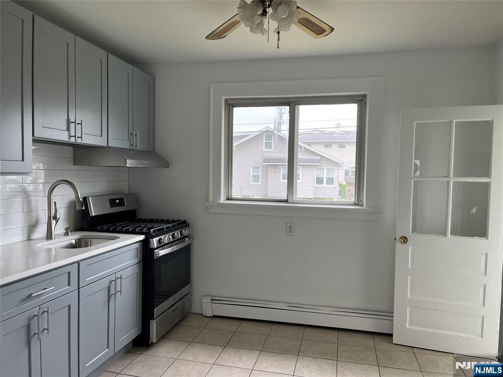 Fully Renovated 2 full bath house!! GREAT location. VERY Close to: NYC train/bus, schools, shopping, day care, houses of worship. New Roof, New Hardwood floor first floor, New Kitchen. 2 NEW full Bathrooms. 2nd floor has a bedroom and bonus room/office. One newly finished large room in basement. Washer and Dryer hook ups and plenty of storage in basement. Enjoy the use of the large and leveled yard. Tenant responsible for lawn care, snow removal, and first $200 of repairs. Garage not included. Parking space for 2 cars. Owner has NJ Real Estate license.