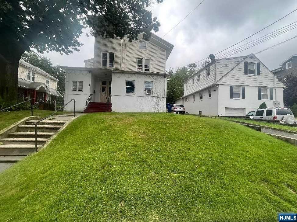 GREAT INVESTMENT OPPORTUNITY! 3 FAMILY HOME, located in the desirable East Fairmount section- THE UNITS ARE BROKEN UP AS FOLLOWS: 1ST.FLOOR RIGHT SIDE APARTMENT CONSISTS OF Huge LIV Rm with High Ceiling a Den * with skylight and a large Hall with 2 BDRMS\EIK\FBTH.; adjacent to the first-floor unit is a Studio Apartment Kitchen and Full Bath. The first floor has separate meters. The 2nd Floor Unit has 4 Big Rooms a Formal living Rm, Kitchen, Full Bathroom, and a separate entrance bonus room that can be used for reading or office, The Bonus room shares a door that can be left open to connect to the Living room for a big family. 3rd Floor Unit: has 2 Bedrooms, Living Room, Kitchen, and Full Bathroom This house has a lot more to offer 5,000 sq ft Living area- Long Driveway- nice back yard - NJ Transit bus and Anderson Train station are within walking distance.