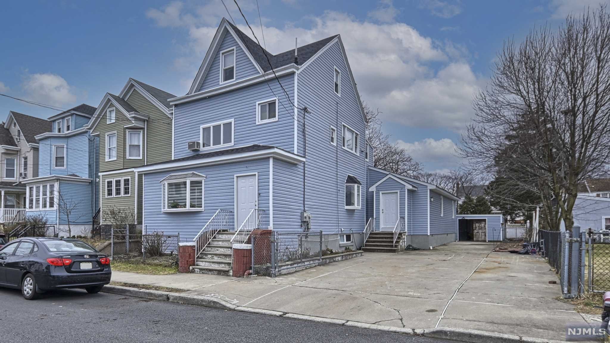 This home is perfect for investors who live in one unit and rent the other or rent both units. Prime location on a quiet street in Clifton. Very Large - 7 BR, 4 BA, Two Family Home that offers lots of possibilities. 1st Floor completely renovated and includes a walk-in pantry. Each unit has Separate Gas and Electric Meters. This is one of the only double-wide driveways on the block, leading to an oversized two-car garage/workshop with electric and wall a/c. The backyard is private with a patio and fenced-in yard.