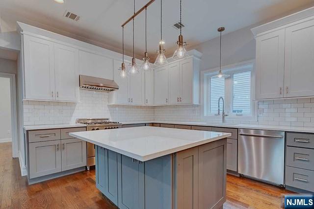 This beautifully renovated property is ideally located in the heart of Montclair close to Walnut St train station, a farmer's market, the best restaurants, shops, and vibrant Walnut St and downtown. The modern open living space provides a convenient lifestyle with high end finishes and smart upgrades. The unit contains 4 bedrooms, three full baths (2 en suite ) and one half bath across two floors. Sunny and spacious, a primary en-suite and great closet space, many remote work options, an enormous backyard and patio, and laundry in the unit.