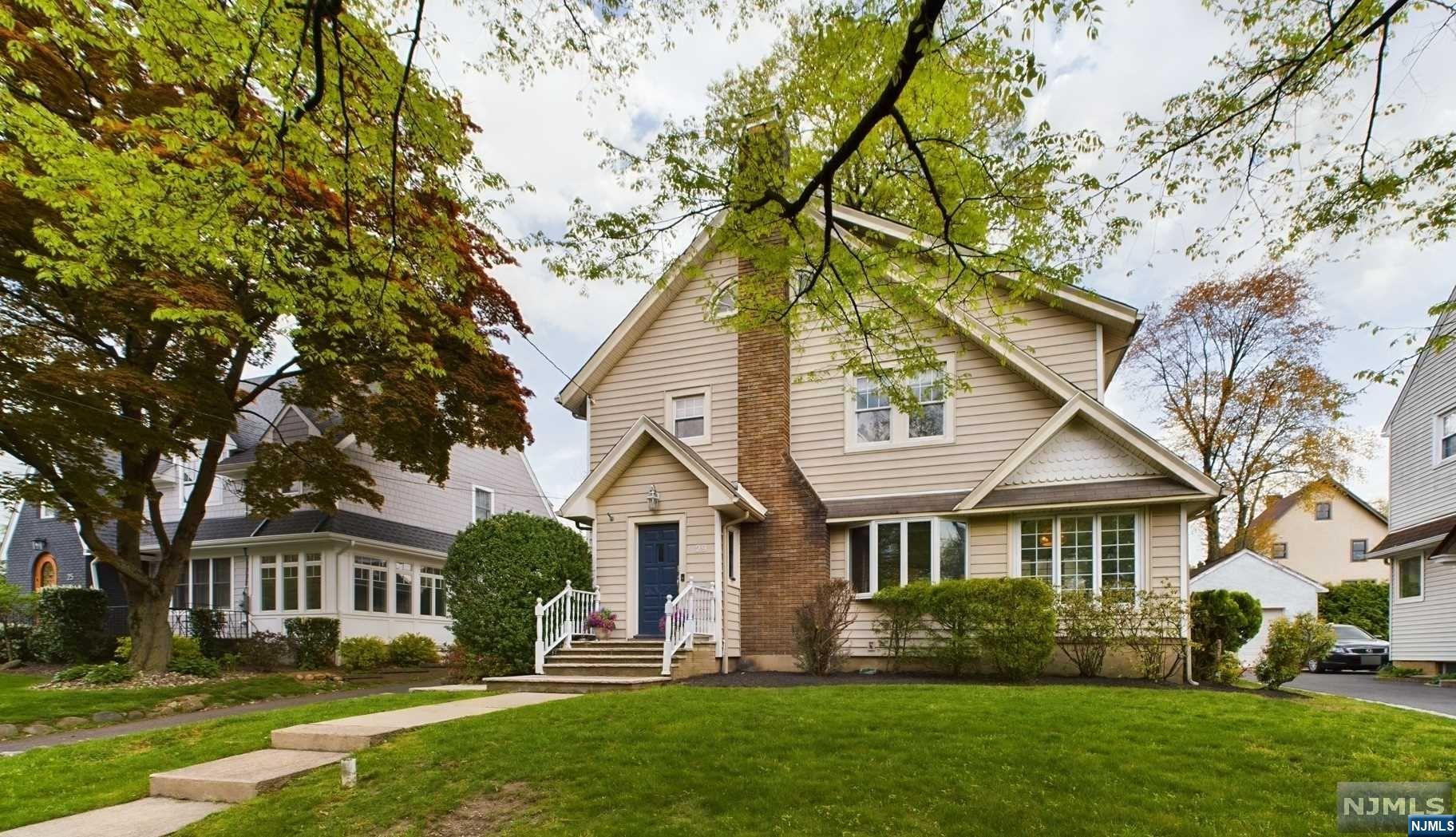Beautiful Colonial home in the most coveted section of Glen Rock. Be part of the Harding Rd. Gang! Upon entering, this side-hall colonial you'll be greeted by a warm and inviting living room with a wood-burning fireplace. Living room is open to the adjoining large eat-in kitchen with a center island that sets the stage for memorable family meals and gatherings. Expand your living space by opening the sliding doors that lead to the outside deck with a sizable private yard. Convenient powder room and mud room right off the kitchen. The large sunroom that provides an abundance of natural light is perfect for a playroom, office or den. Second floor has 3 bedrooms and a full bath. Pull down stairs to a giant walk up attic with plenty of storage space and lots of potential. Full-finished basement with laundry. Move right in or expand to make it your dream home. A Must See! This home is just moments away from top-rated schools, transportation, shopping, dining.