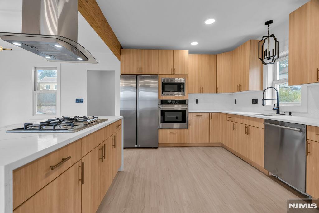Beautifully renovated and move-in ready, this exceptional home at 27 Valley Way offers the perfect blend of style, comfort, and functionality. Featuring 4 spacious bedrooms and 2 fully updated bathrooms, the home showcases modern finishes and thoughtful upgrades throughout. The bright, open-concept layout is anchored by a stunning kitchen with a center island, ideal for entertaining and everyday living. Elegant high-end interior doors, luxurious finishes, and abundant natural light create a sophisticated atmosphere in every room. Additional highlights include brand-new siding, a 2-car garage, washer and dryer hookups, and an unfinished basement offering endless possibilities for future customization or additional living space. Conveniently located in a desirable neighborhood, this turnkey property presents an outstanding opportunity you wonâ€™t want your clients to miss.
