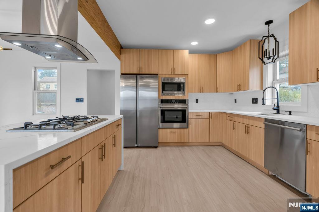 Beautifully renovated and move-in ready, this exceptional home at 27 Valley Way offers the perfect blend of style, comfort, and functionality. Featuring 4 spacious bedrooms and 2 fully updated bathrooms, the home showcases modern finishes and thoughtful upgrades throughout. The bright, open-concept layout is anchored by a stunning kitchen with a center island, ideal for entertaining and everyday living. Elegant high-end interior doors, luxurious finishes, and abundant natural light create a sophisticated atmosphere in every room. Additional highlights include brand-new siding, a 2-car garage, washer and dryer hookups, and an unfinished basement offering endless possibilities for future customization or additional living space. Conveniently located in a desirable neighborhood, this turnkey property presents an outstanding opportunity you wonâ€™t want your clients to miss.