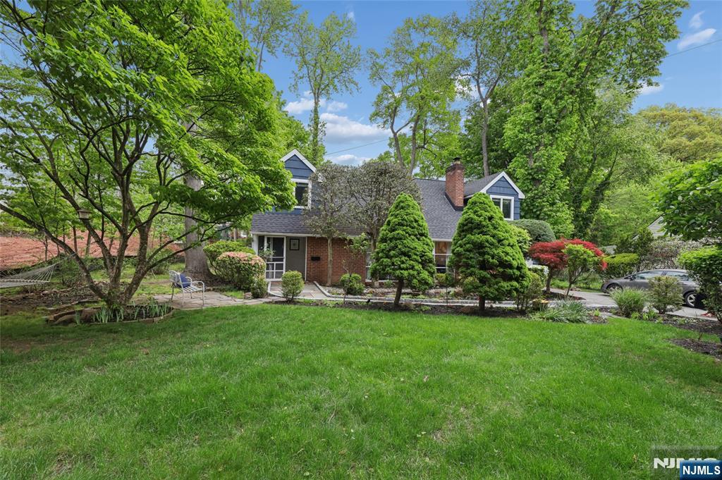 Welcome home! Beautifully renovated 3 bedroom, 3 bath home in the heart of Tenafly featuring exceptional curb appeal & a bright, modern open floor plan. You will immediately be enchanted as you enter this turn key residence filled w/ natural light reflecting off sparkling hardwood floors throughout; spacious living & dining areas; & an inviting layout ideal for both everyday living & entertaining. Enjoy a chefâ€™s kitchen w/ top tier appliances, while contemporary finishes & thoughtful updates elevate every corner of the home. Luxury extends to the second level w/ bright, modern bedrooms offering ample storage, including a true primary suite complete w/ a spa like bath & walk in closet. Step outside to a gorgeous lush & private property featuring a fabulous backyard pool, expansive deck, & patio; the perfect setting for outdoor entertaining, relaxing, & more. Conveniently located near an easy NYC commute, vibrant town amenities, & top rated schools, this is truly a must see!