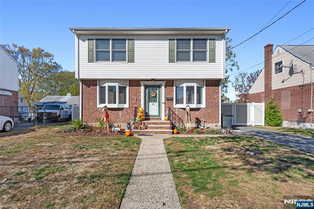 WAIT! Stop looking - here is your home. Featuring 3 bedrooms and 3 full bathrooms, plus a bus stop just down the street, this house offers it all and is close to everything. Located on a dead-end street with a park at the end of the block. The first floor includes a generous living room, dining room, and kitchen with granite counters and heated floors. Off the dining room is a large enclosed porch/3-season room. Upstairs, the second floor offers 3 spacious bedrooms, a walk-in closet in the master, and a grand full bath with an adjoining door to the master. Wait, there is more! The basement is fully finished with a rec room, kitchen,laundry, and updated full bath. Outside, you have a fantastic and entertaining yard with an above-ground pool, a long driveway, and a 1-car detached garage. There are hardwood floors as seen on the 1st floor and central AC. What else can you ask for? You do not want to let this pass you by!