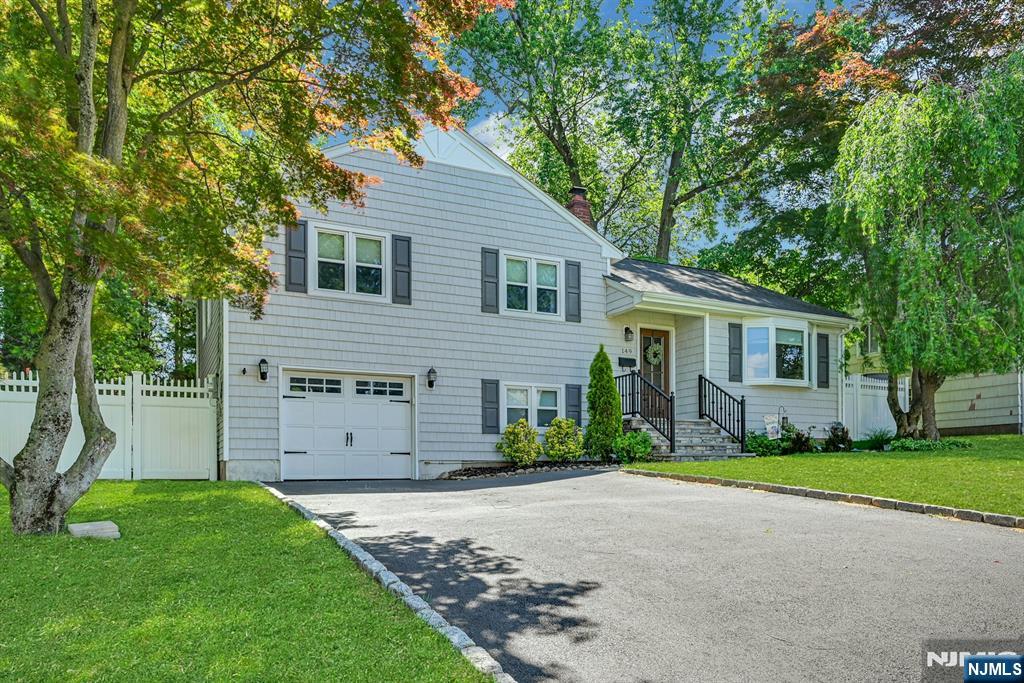 Beautifully updated 3-bedroom, 2.5-bath split-level home located in desirable Emerson, NJ. This move in ready property features a stunning custom kitchen with Amish crafted cabinetry, renovated bathrooms, newer roof, siding, windows, HVAC systems, and countless additional updates throughout. Enjoy a spacious fenced in backyard with an updated covered patio, perfect for entertaining, relaxing, and outdoor gatherings. Conveniently located near schools, parks, shopping, dining, and commuter transportation, this home offers the perfect blend of comfort, style, and convenience.