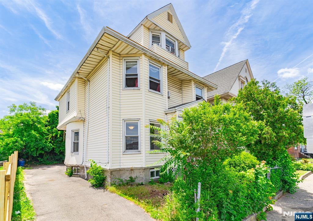 Don't miss this opportunity to own a versatile 2-family property in East Orange. Featuring two residential units, a bonus walkout lower level, and a private driveway, this property offers flexibility for a variety of living or investment needs. Delivered vacant at closing, allowing the next owner to maximize its potential from day one. Convenient location with easy access to public transportation, major highways, shopping, restaurants, and everyday conveniences.