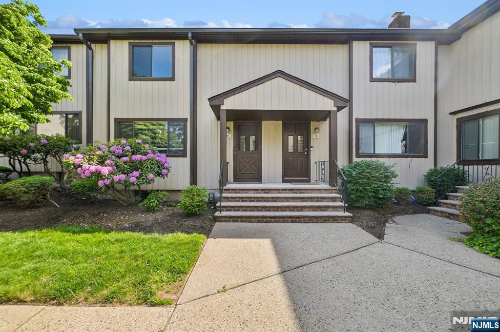 One of the largest 3-bed, 2.5-bath townhome in sought-after Hearthwood Village. The main level offers a bright living room flowing into a formal dining room, an eat-in kitchen with pantry, and a den with sliding doors to a deck. A convenient powder room completes the first floor. Upstairs features a primary bedroom with ensuite bath, two additional bedrooms, and a full bath. The finished basement adds a large recreation room, office, laundry room, storage, and utility space. Pet-friendly community amenities include an outdoor pool, clubhouse, tennis courts, playground, and ample guest parking. Assigned parking plus additional "G spaces. Ideally located near Trader Joe's, CVS, shops, dining, Morristown train, major highways, gyms, and golf. Home being sold strictly as-is.
