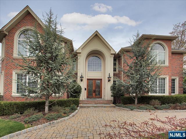 Explore Colonial-style masterpiece located in the prestigious North Cliffs area, featuring 5 bedrooms, 5.5 bathrooms, and a 3-car garage. Built to perfection by a top-tier builder, this home is equipped with a full backup generator and bathed in natural light due to its favorable southern exposure. The private backyard, complete with a pool, offers a secluded haven perfect for entertaining. Exquisite craftsmanship is evident throughout, with vaulted ceilings, radiant heating, and high-end finishes including granite, marble, and slate. The home boasts a wet bar, multiple fireplaces, multi-zone heating, a wine cellar, a master bathroom with Jacuzzi and steam shower, and top-of-the-line New Sub-Zero , new Dishwasher and Wolf appliances. New Sub-Zero , new Dishwasher Designed for those who love to entertain, the property is set amidst lush landscaping with sprawling patios and a Gunite pool. This residence is a showcase of luxury, with too many exceptional details to list.