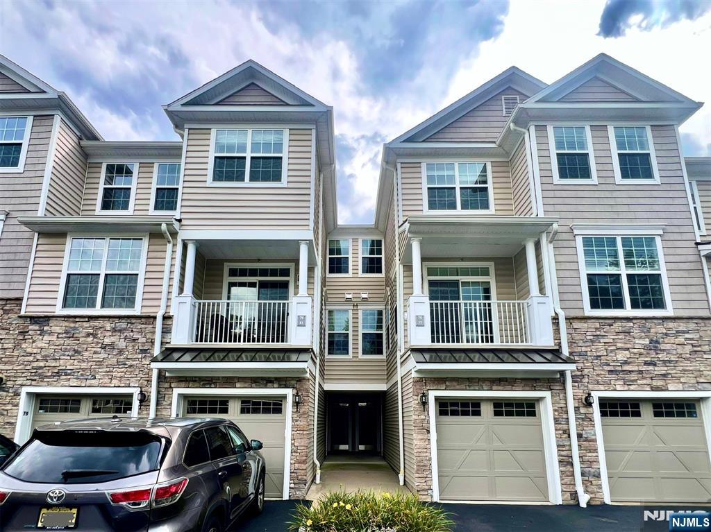 "The Reserve at Montvale " town homes, This prestigious community is set in a private location. Absolutely stunning 3 Br, 2.5 bath unit offers luxury and elegance. The ground level offers a welcoming foyer entrance/ attached one-car garage. Beautiful spacious vaulted living room opens to dining area with sliding glass doors to balcony. Very large eat in kitchen with the open space, Kitchen offers plenty of cabinet with stainless steel appliances, vaulted ceilings, huge picture windows and hardwood floors. The 2nd levels boasts extra large primary bedroom suite with large walk-in closet and luxurious primary bath. Two large additional bedrooms, a full bath, wonderful loft space for office / family room. laundry room. Convenient to highly rated schools, Ideally located close to schools, shopping, and NYC transportation, style, Situated close to downtown Montvale, which provides eateries, library and other amenities. This home offers comfort, will be professionally painted. MUST SEE!!!