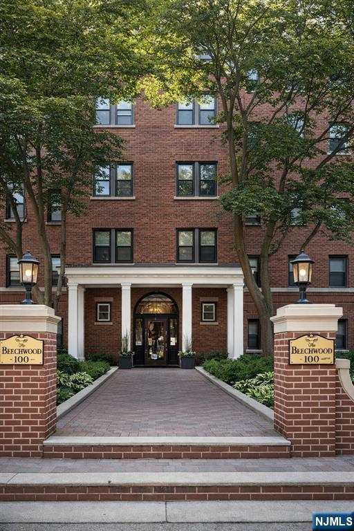 Welcome to the Beechwood, a beautiful Art Deco building offering timeless charm and modern convenience. This spacious Condo features an open floor plan with high ceilings, crown molding, gleaming hardwood floors and large windows that fill the home with natural sunlight. Elegant French doors lead to a bedroom with custom built-ins, while arched doorways add character and sophistication throughout the home. The kitchen is light and bright complete with stainless steel appliances and ample space for everyday living. Location is everything, and this home is truly a commuter's dream conveniently located just two blocks from Hackensack Medical Center, easy access to trains and bus transportation, and 15 minutes from NYC. Assigned parking is available for $60.00 a month, with garage parking also available for an additional $100.00 per month. Don't miss the opportunity to own this exceptional home in a prime location.